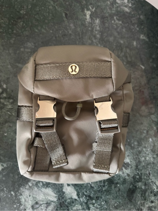 lululemon athletica Accessories - NWT Lululemon Wunderlust Backpwck Nano in Balf/Gold